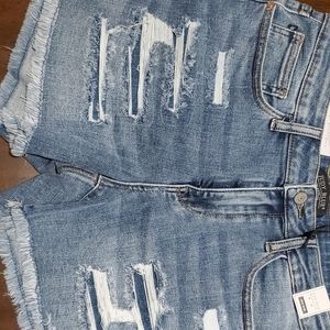 Brad new Judy Blue Jean shorts size large. Style JB150122